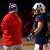 Liberty's head coach Richard Muraco congratulates player Ethan Dedeaux (2) on another score versus Green Valley during their high school state quarterfinal game at Liberty on Friday, November 20, 2015.