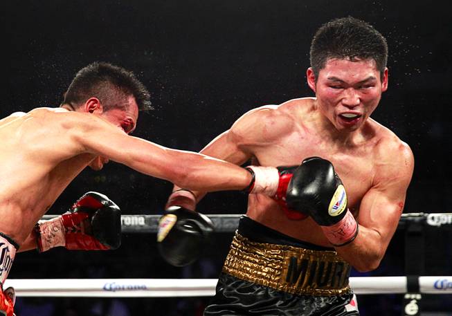WBC super featherweight champion Takashi Miura of Japan and Francisco Vargas of Mexico during their title fight at the Mandalay Bay Events Center Saturday, Nov. 21, 2015.