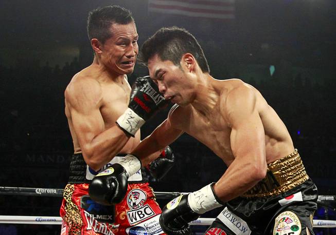 WBC super featherweight champion Takashi Miura of Japan and Francisco Vargas of Mexico during their title fight at the Mandalay Bay Events Center Saturday, Nov. 21, 2015.