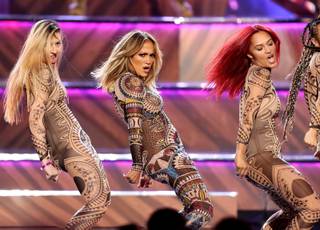 Host Jennifer Lopez performs during the American Music Awards at Microsoft Theater on Sunday, Nov. 22, 2015, in Los Angeles.