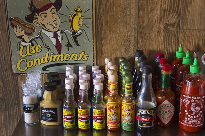 An assortment of condiments are displayed at the Steamie Weenie, 1500 N Green Valley Parkway, in the Pebble Marketplace in Henderson Sunday, Nov. 22, 2015.