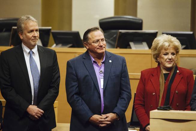 From the left, City of Las Vegas Planning Director Tom Perrigo, Mayor Pro Tem Steve Ross, and Mayor Carolyn Goodman listen to a speaker during a press conference with NV Energy at Las Vegas City Hall on November 24, 2015..