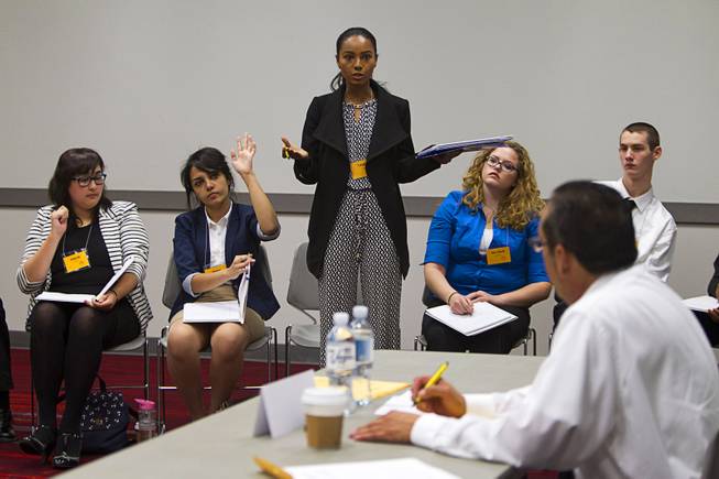 Tobista Fetwi, center, Desert Oasis High School speaks her opinion during the 2015 Las Vegas Sun Youth Forum at the Las Vegas Convention Center Tuesday, Nov. 24, 2015.