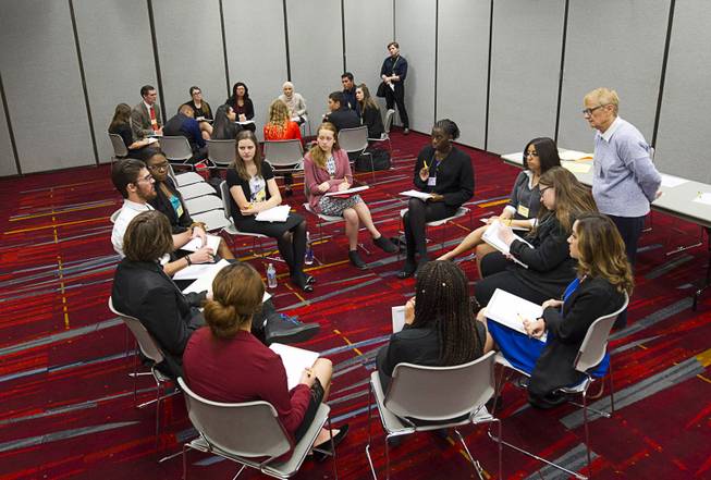 Students break into groups during the 2015 Las Vegas Sun Youth Forum at the Las Vegas Convention Center Tuesday, Nov. 24, 2015.