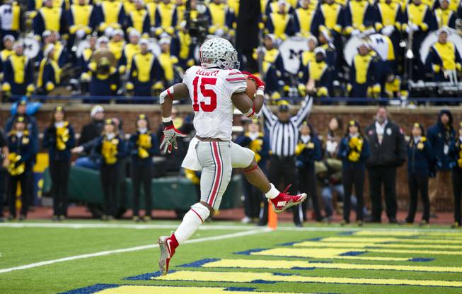Ohio State running back Ezekiel Elliott (15) high-steps into the end zone to score a touchdown.