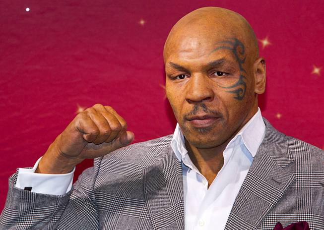 The world's first Mike Tyson wax figure is shown after an unveiling at Madame Tussauds on Tuesday, Dec. 1, 2015, at Madame Tussauds Las Vegas. The figure is modeled after Tyson’s appearance as himself in “The Hangover.” The figure will be permanently displayed inside the attraction’s “The Hangover Experience” exhibit.