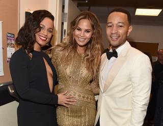 Alicia Keys, a pregnant Chrissy Teigen and John Legend attend the “Sinatra 100” tribute and Grammy concert at Encore Theater on Wednesday, Dec. 2, 2015, at Wynn Las Vegas.