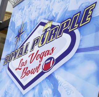 The Royal Purple Las Vegas Bowl logo is seen Sunday, Dec. 6, 2015, during the announcement of the bowl matchup. Utah and BYU will play in the Royal Purple Las Vegas Bowl at Sam Boyd Stadium on Saturday, Dec. 19, 2015.