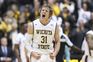Wichita State guard Ron Baker yells during the first half of an NCAA college basketball game against UNLV on Wednesday, Dec. 9, 2015, in Wichita, Kan. 