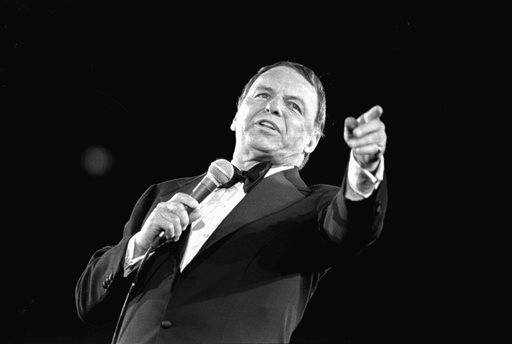 This April 9, 1974, file photo shows Frank Sinatra performing at Nassau Veterans Memorial Coliseum in Uniondale, N.Y. Sinatra, who died in 1998 at age 82, would have celebrated his 100th birthday on Dec. 12, 2015.