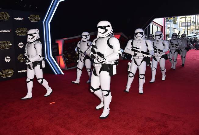 Stormtroopers march on the red carpet at the world premiere of "Star Wars: The Force Awakens" at TCL Chinese Theater on Monday, Dec. 14, 2015, in Los Angeles. 