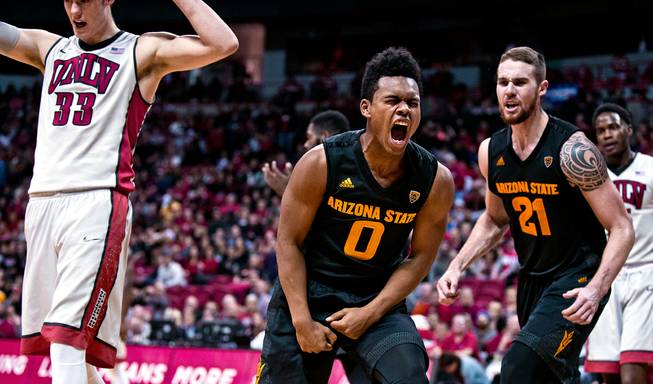 Arizona State guard Tra Holder (0) yells out after a late basket and foul versus UNLV at the Thomas & Mack Center on Wednesday, December 16, 2015.
