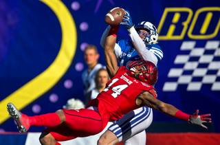 Utah defensive back Brian Allen (14) breaks up a touchdown pass intended for BYU wide receiver Mitch Mathews (10) during the 2015 Royal Purple Las Vegas Bowl at Sam Boyd Stadium on Saturday, December 19, 2015.