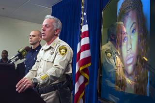 Sheriff Joe Lombardo speaks during a news conference at Las Vegas Metro Police headquarters Monday, Dec. 21, 2015. Lombardo spoke on the fatal auto-pedestrian accident that killed one and injured over 30 people on the Las Vegas Strip Sunday night. A mugshot of suspect Lakeisha Holloway, 24, appears at right.