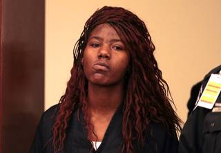 Lakeisha Nicole Holloway, 24, of Oregon enters the courtroom Wednesday, Dec. 23, 2015, for her initial appearance at Regional Justice Center. Holloway faces charges in a crash that killed one pedestrian and injured 35 others on the Strip on Dec. 20.
