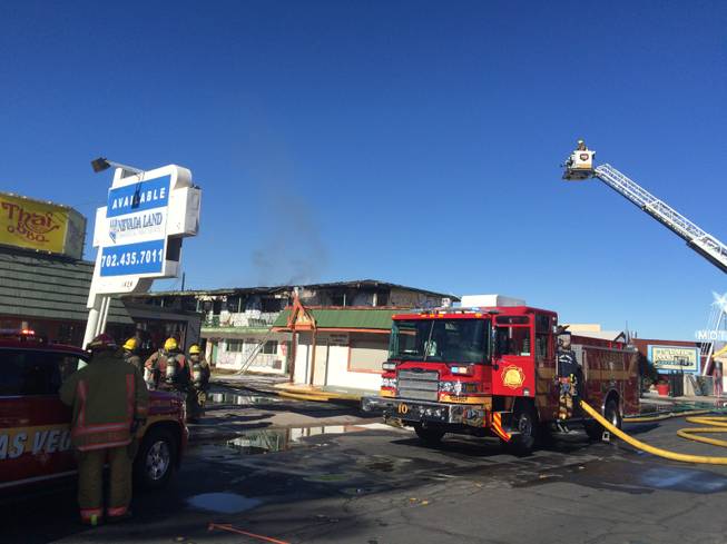 Crews from Las Vegas Fire & Rescue contained a fire inside a vacant motel near downtown within 30 minutes on Dec. 28, 2015