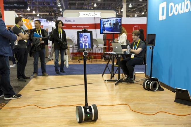 Double Robotic's Telepresence robot allows users to move and communicate remotely. CES Wed. Jan 6, 2016.