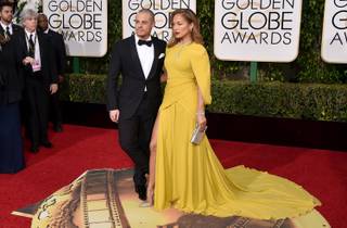 Casper Smart and Jennifer Lopez arrive at the 73rd annual Golden Globe Awards on Sunday, Jan. 10, 2016, at the Beverly Hilton Hotel in Beverly Hills, Calif.