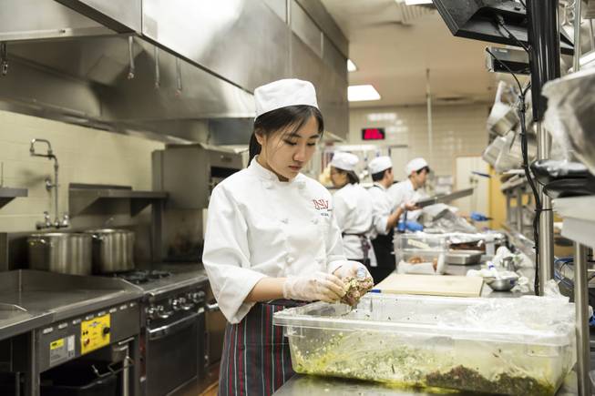 Students fron UNLV's Food and Beverage program prepare a banquet meal at Beam Hall, Friday Nov. 20, 2015.