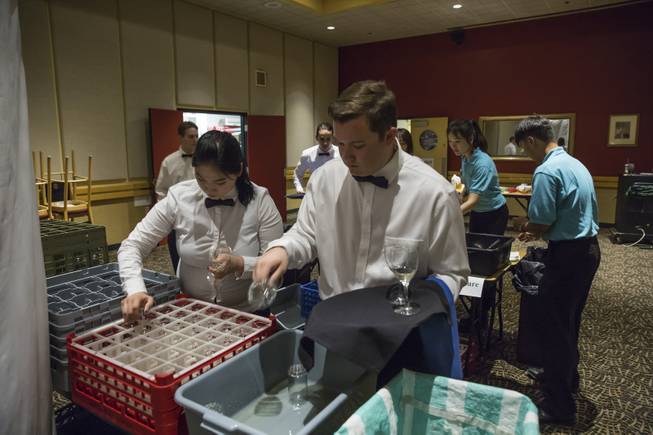 Students fron UNLV's Food and Beverage program prepare a banquet meal at Beam Hall, Friday Nov. 20, 2015.
