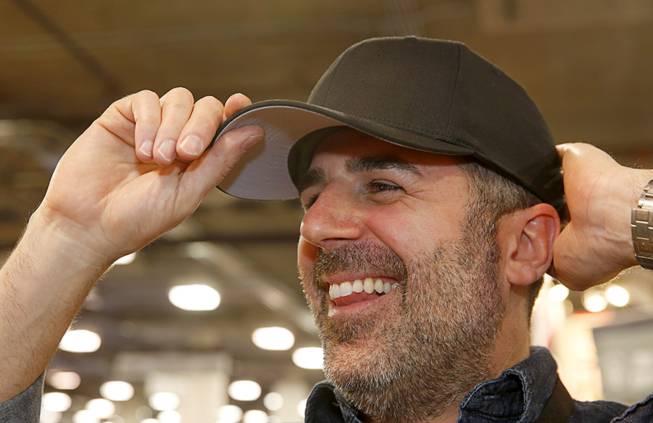 Tom Nardone models a BulletSafe bulletproof baseball cap during the SHOT (Shooting, Hunting and Outdoor Trade) Show at the Sands Expo Tuesday, Jan. 19, 2016.  The cap, which offers frontal protection, isnt meant to replace a helmet, but can be worn all of the time and projects a more approachable image, Nardone said.