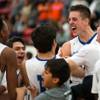 Bishop Gorman players celebrate their win over Findlay Prep during basketball at the South Point Casino on Saturday, January 23, 2016.