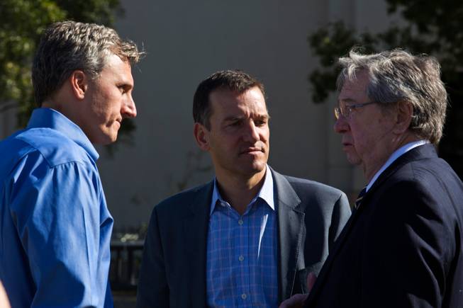 From left: SolarCity CEO Lyndon Rive, Marco Krapels, Senior VP of Strategy SolarCity, and former Gov. Bob List converse during a rally for solar energy held at Town Square Las Vegas, Monday Jan. 25, 2016.