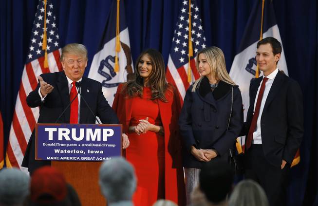 Republican presidential candidate Donald Trump, accompanied by, from second from left, wife Melania, daughter Ivanka, her husband, Jared Kushner, speaks during a campaign event, Monday, Feb. 1, 2016 in Waterloo, Iowa.