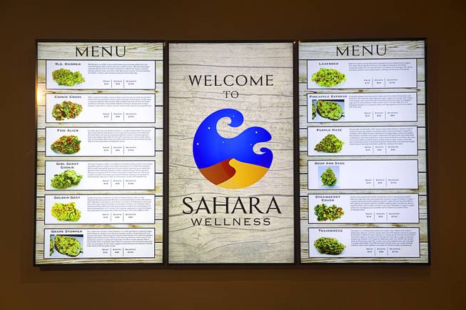 A menu is displayed at Sahara Wellness, at 420 E. Sahara Ave., Tuesday, Feb. 2, 2016. The facility is the the first all-female-owned medical marijuana dispensary in Las Vegas.