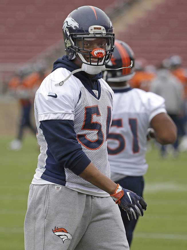 Denver Broncos linebacker Brandon Marshall smiles during an NFL football practice in Stanford, Calif., Wednesday, Feb. 3, 2016. 