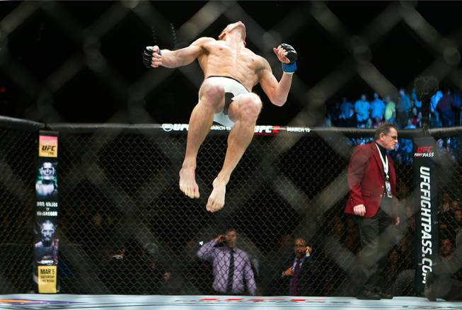 Welterweight Stephen Thompson celebrates his win over Johny Hendricks with a backflip following their UFC Fight Night 82 match at the MGM Grand Garden Arena on Saturday, February 6 2016.  L.E. Baskow