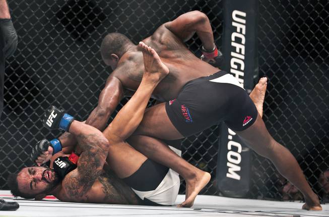 Light Heavyweight Rafael Feijao takes another hard punch to the face from Ovince Saint Preux during their UFC Fight Night 82 match at the MGM Grand Garden Arena on Saturday, February 6 2016.  L.E. Baskow