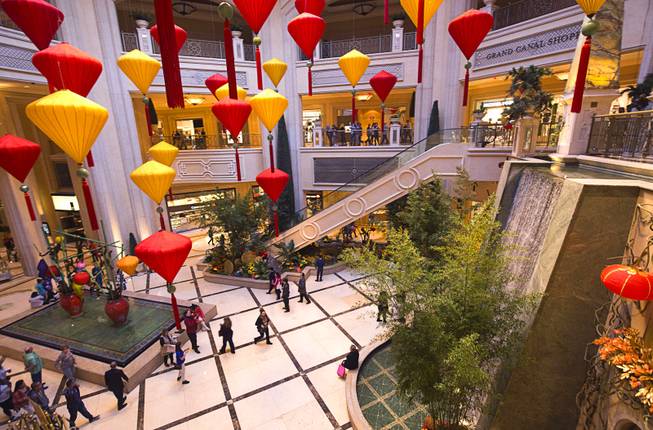 Chinese New Year decorations are displayed in the Waterfall Atrium and Gardens of The Palazzo Monday, Feb. 8, 2016. The Chinese New Year, the Year of the Monkey, began Monday.