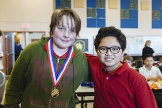 Fifth-graders Gabriel Wallace, left, and Kyle Sucaldito during a lunch break at Steven G. Schorr Elementary School on Feb. 10, 2016. In January, Gabriel saved Kyle from choking on his lunch.