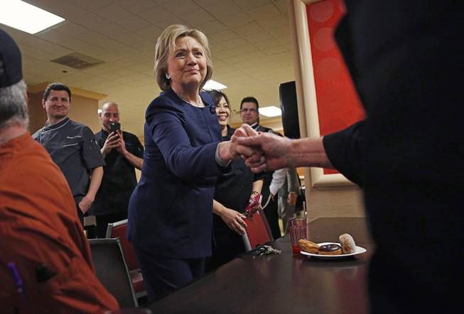 Democratic presidential candidate Hillary Clinton meets with employees of Harrah's on Saturday, Feb. 13, 2016, in Las Vegas.