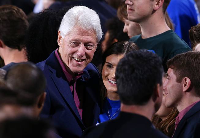 Former President Bill  Clinton greets supporters and poses for photos during a rally for Democratic presidential candidate Hillary Clinton at the Clark County Government Center Friday, Feb. 19, 2016.