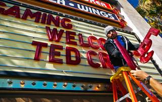 T.J. Vanderford and Nick Kirsch change the letters on the Best Western welcome sign for Republican presidential candidate Ted Cruz making a visit to Pahrump for a rally at the Draft Picks Sports Bar on Sunday, February 21, 2016.
