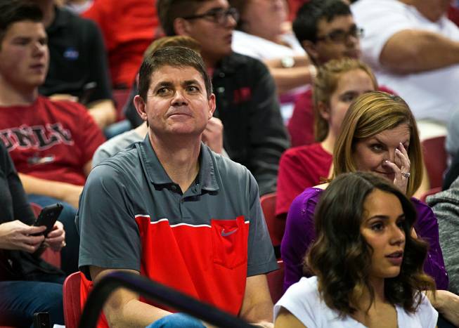 Former UNLV head basketball coach Dave Rice sits in the stands during a game against Wyoming on Saturday, Feb. 27, 2016, at the Thomas & Mack Center.