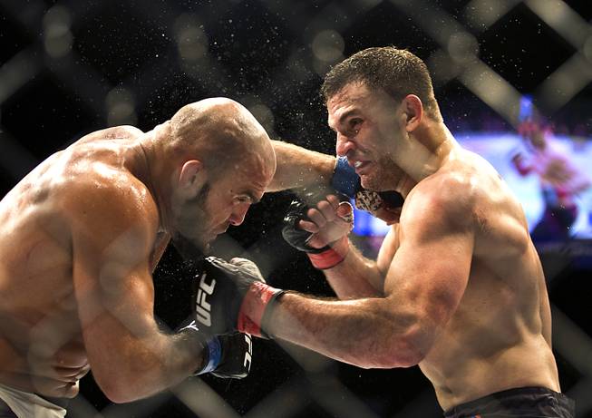 Light Heavyweight  Ilir Latifi  and Gian Villante trade blows in their fight during UFC 196 from the MGM Grand Garden Arena on Saturday, March 5, 2016.