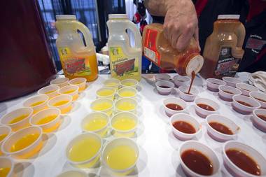Samples of Redneck Juice cocktail mixers are prepared during the 2016 Nightclub & Bar convention at the Las Vegas Convention Center Tuesday, March 8, 2016.