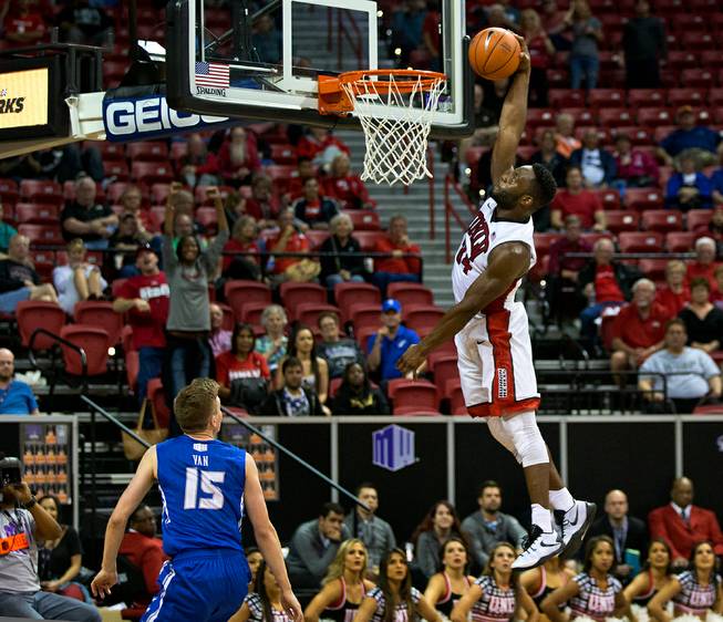 UNLV guard Ike Nwamu (34) readies to dunk the ball finishing off Air Force in triple overtime during their Mountain West Championship first game at the Thomas & Mack Center on Wednesday, March 9, 2016.