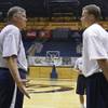 In this Sept. 25, 2008, file photo, then-California head coach Mike Montgomery, left, talks with his son, John Montgomery, right, during basketball practice in Berkeley, Calif. When California's season ended, John Montgomery reached out to a handful of his former players and wished them a deep, special NCAA Tournament run. That was before the draw came out. Montgomery is now an assistant coach at Hawaii, and will face the Golden Bears in a first-round matchup on Friday. 
