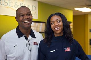 High-jumper Vashti Cunningham, 18-year-old daughter of former UNLV and NFL quarterback Randall Cunningham, stands with her dad after a news conference at Remnant Ministries on Monday, March 21, 2016. Vashti Cunningham, a Bishop Gorman High senior, announced that she is taking an endorsement deal from Nike and turning professional.