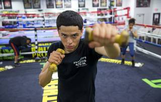 Saul Gomez, 19, works out at the Mayweather Boxing Club Monday, March 28, 2016. Gomez is one of three locals boxers qualified for the national Golden Gloves amateur boxing competition.