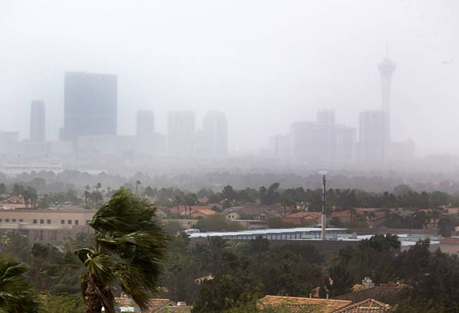 Strip casinos are obscured by blowing dust in this view from Henderson Monday, March 28, 2016. 