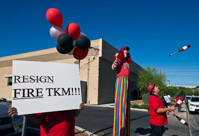 A protest to UNLV Director of Athletics Tina Kunzer-Murphy greets attendees outside as the new UNLV basketball coach Marvin Menzies appears before the  Nevada Board of Regents to get his contract approved on Friday, April 22, 2016.