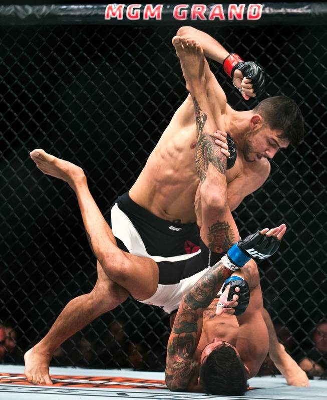 Featherweight Yair Rodriguez dominates Andre Fili from above during their UFC 197 match at the MGM Grand Garden Arena on Friday, April 23, 2016.