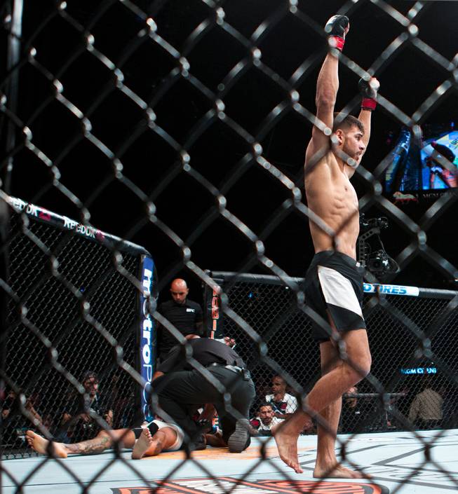 Featherweight Yair Rodriguez celebrates his knockout of Andre Fili during their UFC 197 match at the MGM Grand Garden Arena on Friday, April 23, 2016.