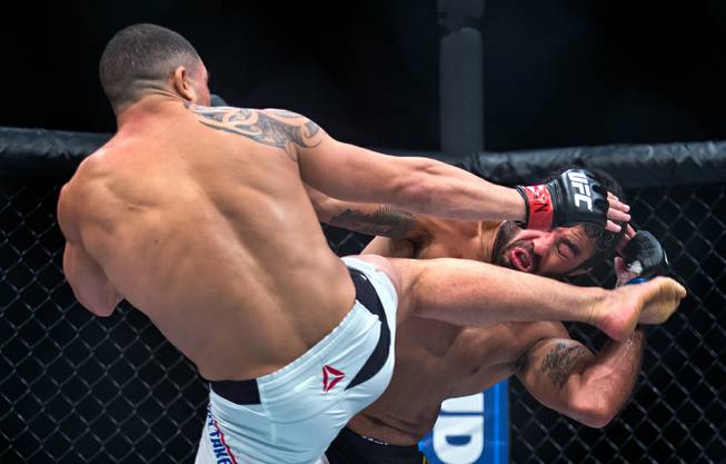 Middleweight Robert Whittaker sends a kick to the head of Rafael Natal during their UFC 197 match at the MGM Grand Garden Arena on Friday, April 23, 2016.
