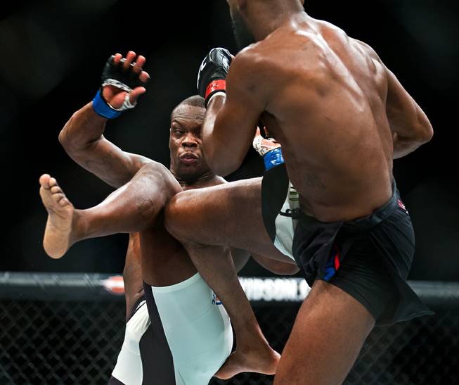 Light Heavyweight Ovince St. Preux trades kicks with Jon Jones during their UFC 197 match at the MGM Grand Garden Arena on Friday, April 23, 2016.
